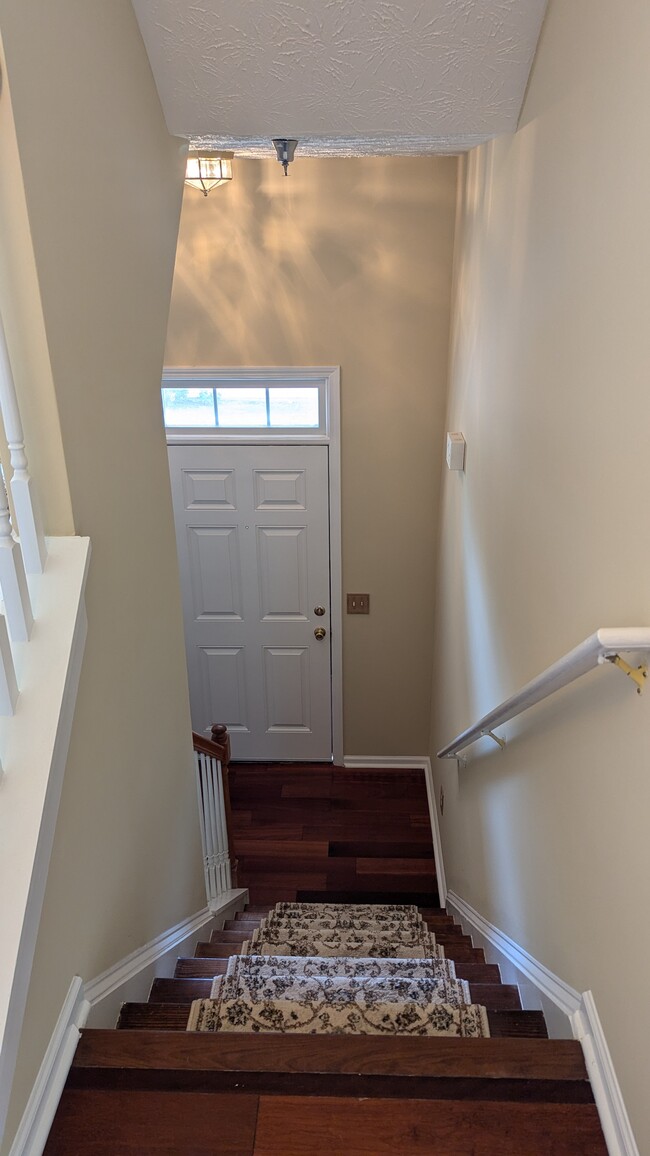 Foyer/Stairs to the main (2) Floor - 221 Village Square Dr