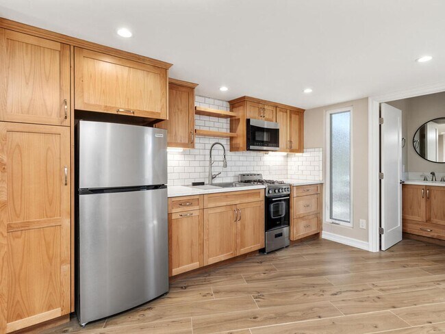Building Photo - Studio with Loft, Private Patio, and All U...