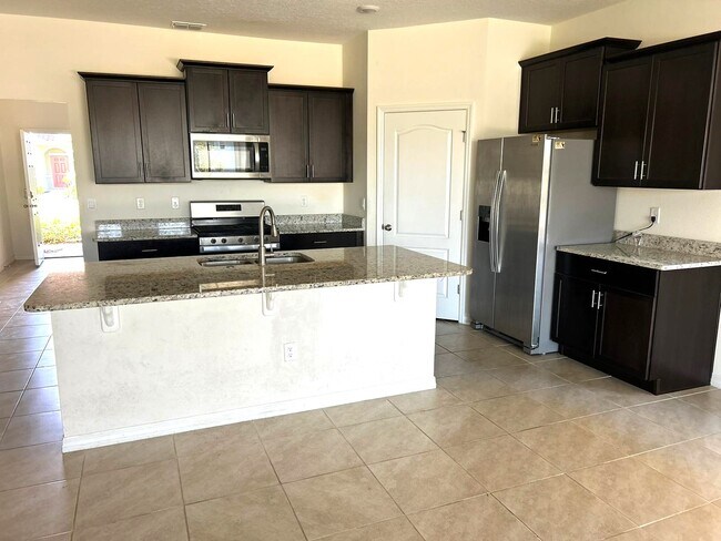 Building Photo - 7604 Oakmoss Loop