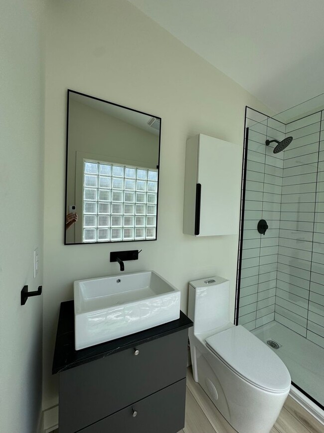 Building Photo - Vaulted Ceilings & Hardwood Floors in This Charming Indianapolis L