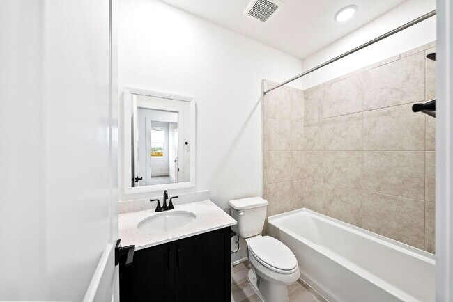 Building Photo - Charming Townhome Offering Space, Comfort, and Convenience