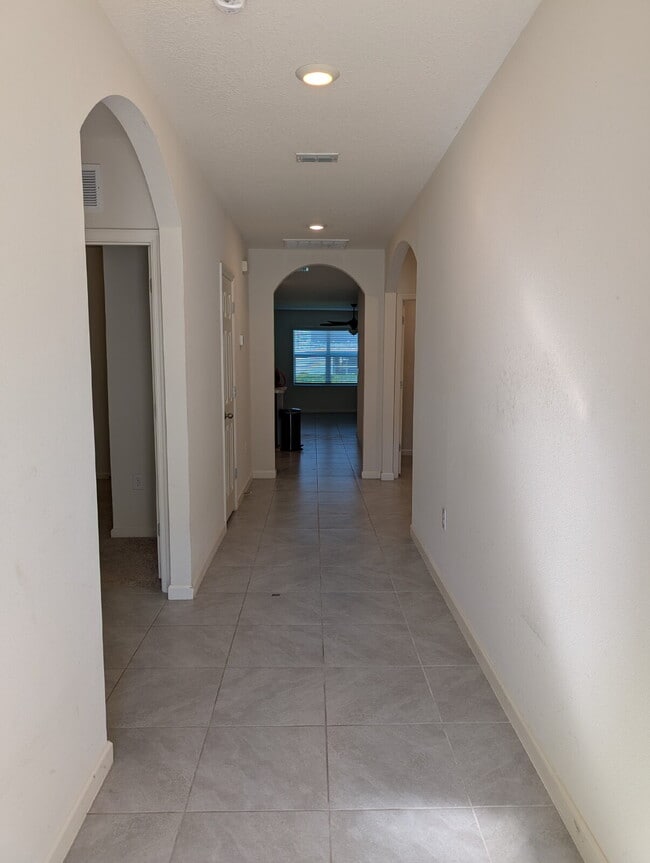 Building Photo - Modern 4-Bedroom Home with Large Backyard in Quiet SW Palm Bay – Available Mid-June