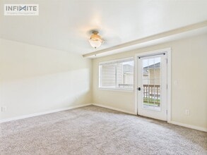 Building Photo - Cute As A Button 2 Bedroom Condo on Baxter Lane!