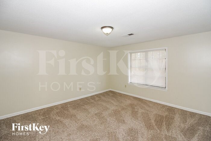 Building Photo - 4965 Gardenwood Dr