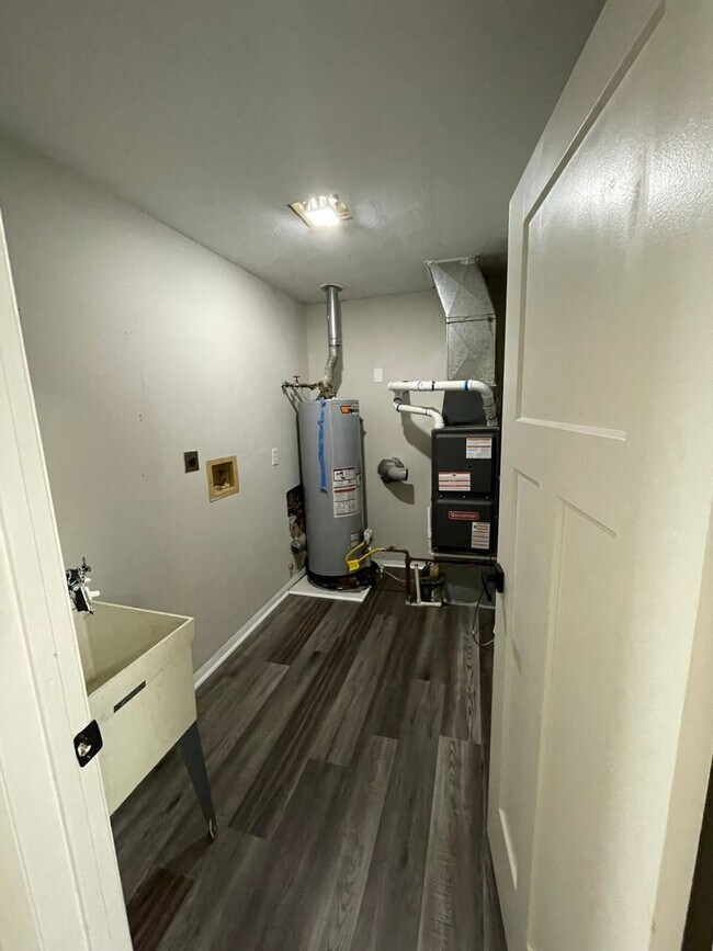 Building Photo - Oversized 3 Bedroom with laundry room!