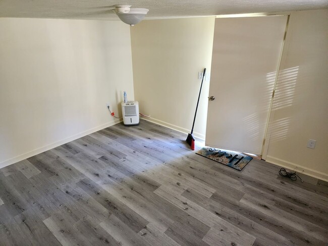 Building Photo - Affordable Apartment Outside the City Limits