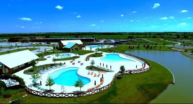Multiple luxury pools for all ages throughout the community, including a junior Olympic pool - 621 Hummingbird Dr