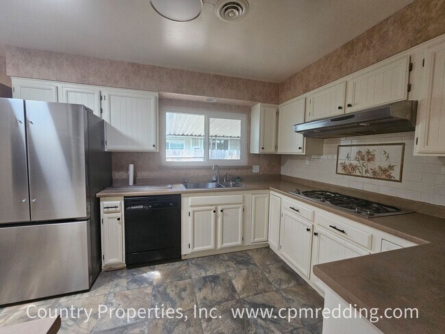 Building Photo - 4-Bedroom in the Garden Tract with Shop & ...