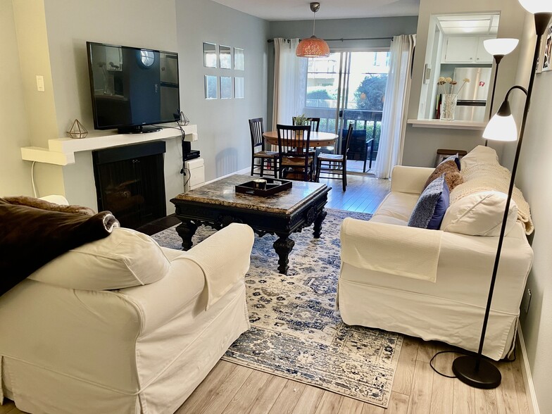 Calm, peaceful living room with views of the pool. - 4111 Summertime Ln