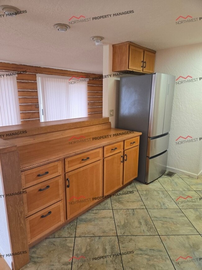 Building Photo - STATUS: *RENTED*| R66C | $1395 + $200 flat rate utility surcharge W/S/E