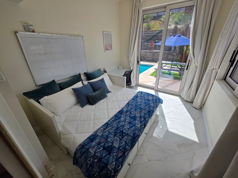 Building Photo - 6097 Charae St