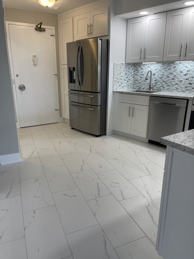 Brand new kitchen and floor - 300 N State St