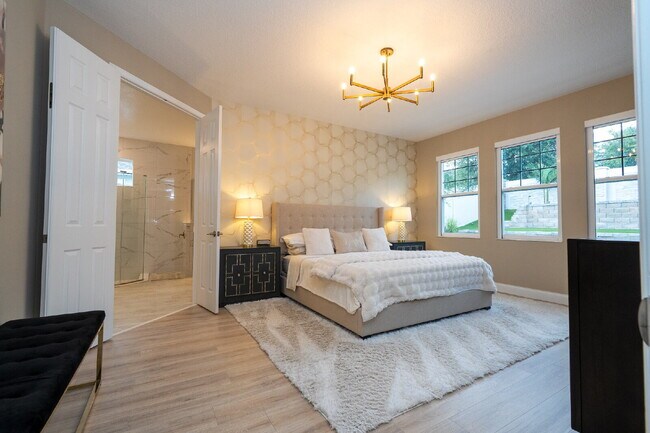 Building Photo - "Spacious 4-Bedroom Retreat with 3 Full Baths in Winter Garden's Serene Sanctuary"