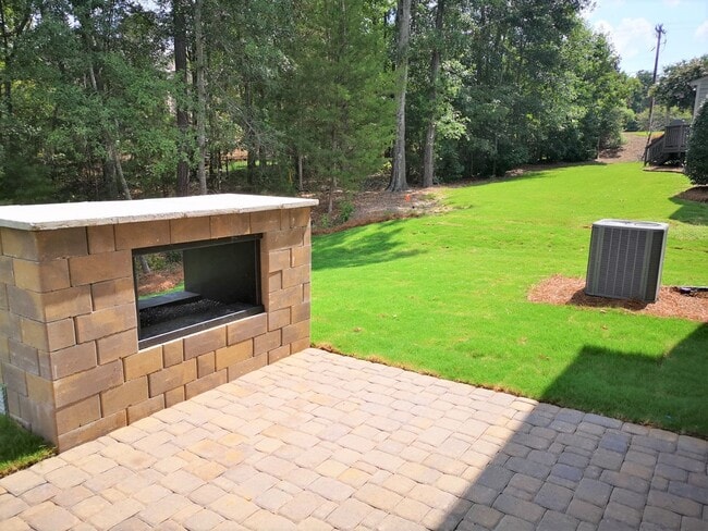 Building Photo - This Almost New Construction home, with 5 bedrooms & 4 baths