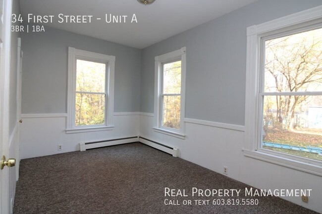 Building Photo - Spacious 3 Bedroom Apartment- Heat Include...