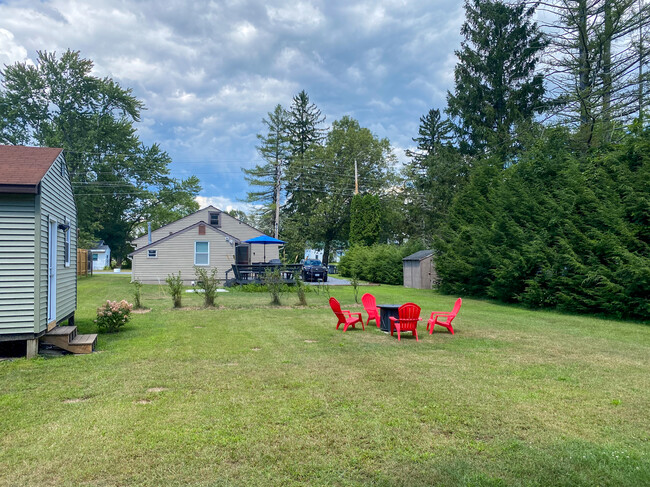 large private backyard, trees and fence all around - 10 Newark St