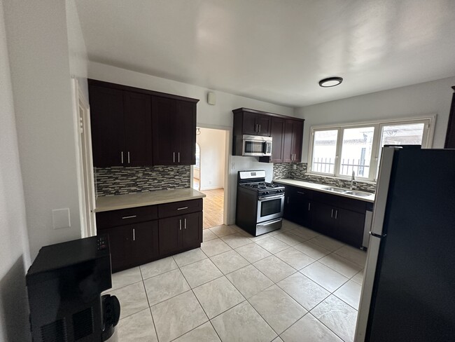 1618 updated kitchen with water dispenser, dishwasher, and refrigerator - 1618 Hauser Boulevard