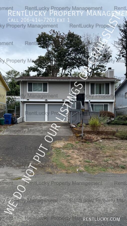 Building Photo - 6718 23rd Ave SW