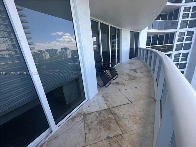 Building Photo - 18911 Collins Ave