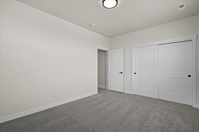 Building Photo - Spacious 4-Bedroom Home with Modern Comforts