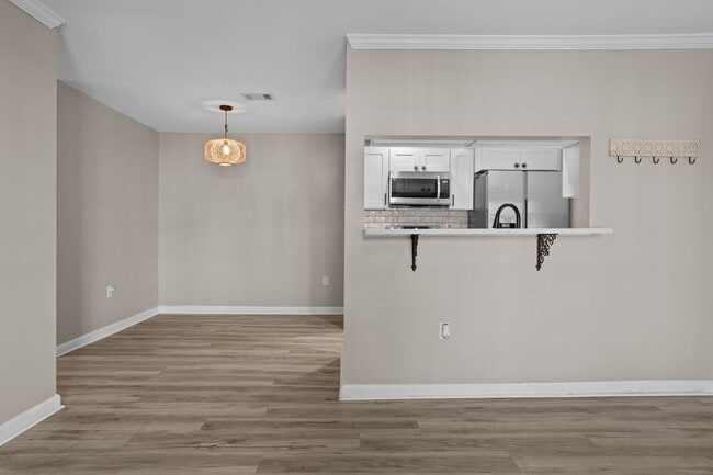 Building Photo - Welcome to Harbor Landing Condominiums — where coastal living meets convenience!