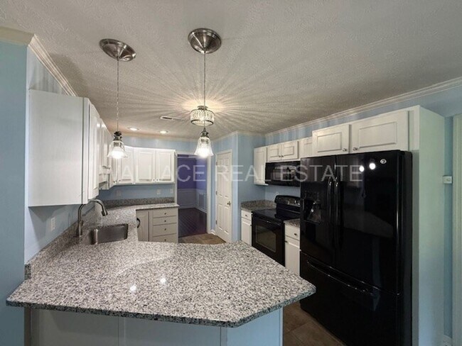 Building Photo - HARDIN VALLEY:  3 BEDROOM, 2.5 BATH IN BRI...