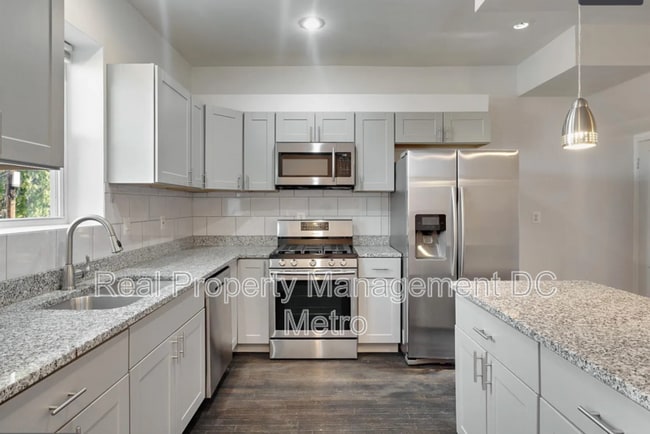 Building Photo - 1397 Sheridan St NW