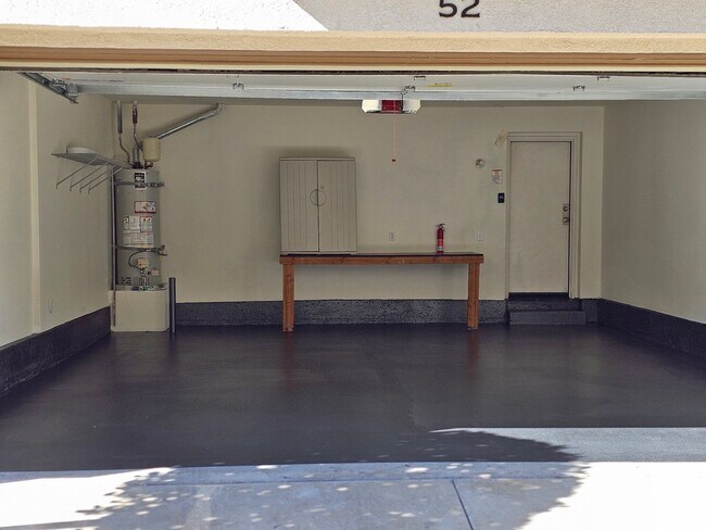 Building Photo - PICTURE PERFECT!  3 BR/3 BA END UNIT CONDO with DIRECT ACCESS 2 CAR GARAGE