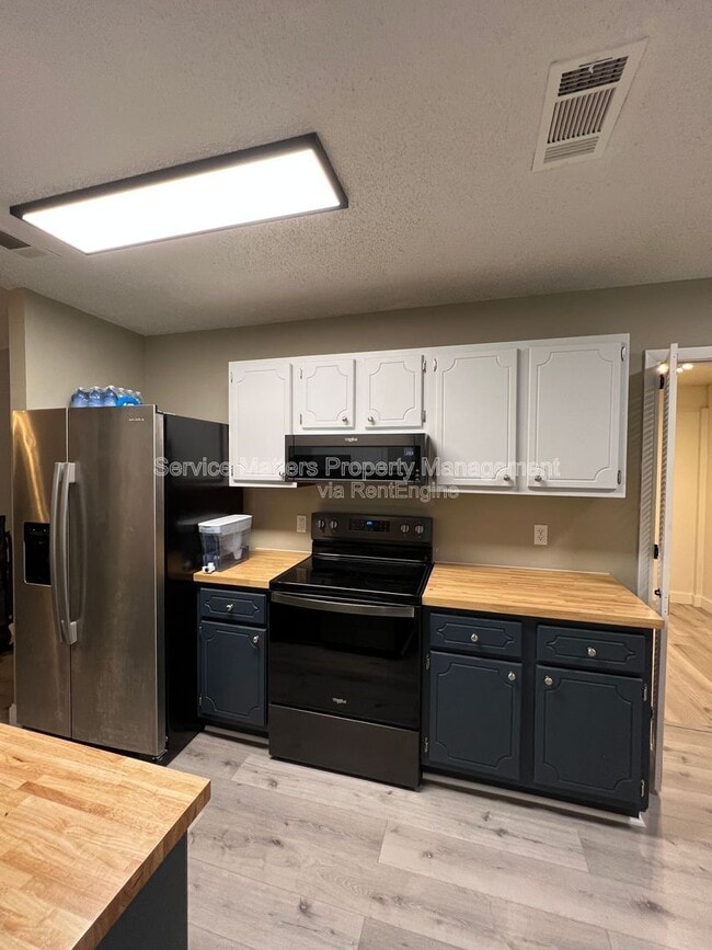 Building Photo - 7777 Needlerush Dr