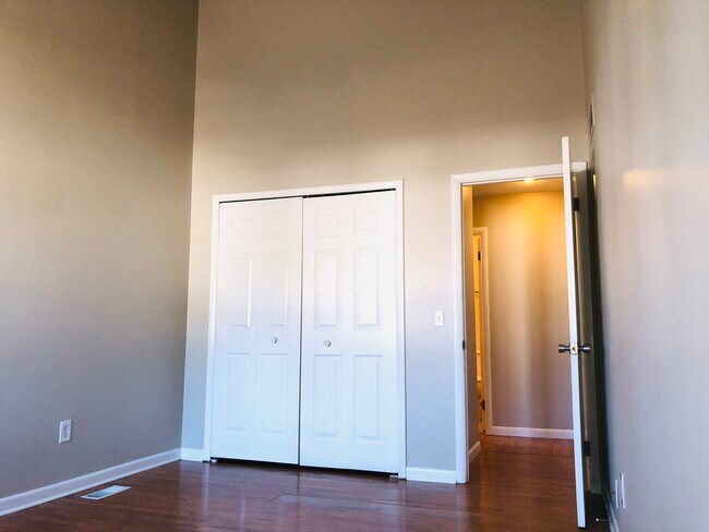 Bedroom 2 with vaulted ceiling - 2550 W Village Dr