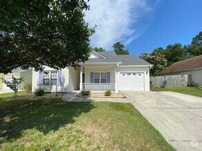 Building Photo - Welcome to this stunning 3-bedroom, 2-bath...