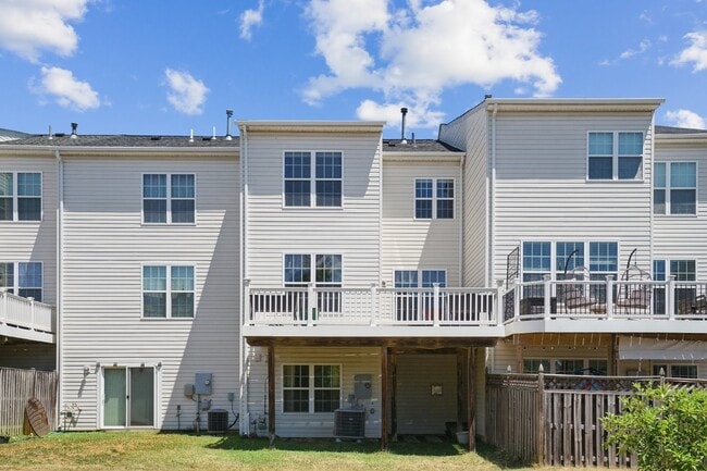 Building Photo - This beautiful townhome spans three finished levels and over 2800 square feet.