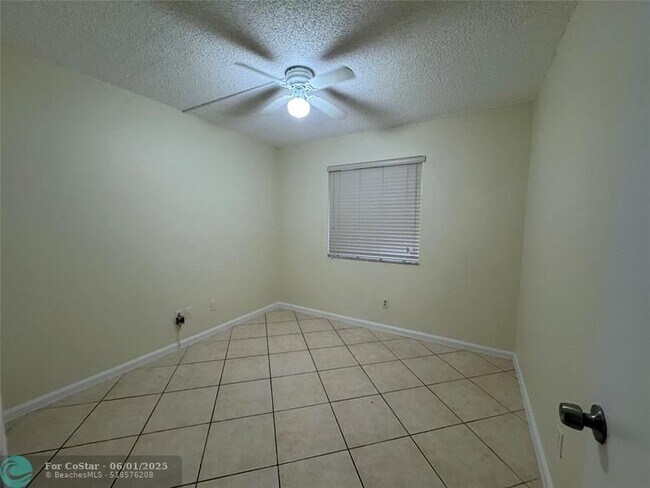Building Photo - 12222 Royal Palm Blvd