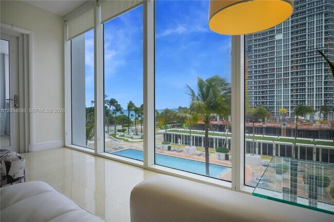 Building Photo - 10275 Collins Ave