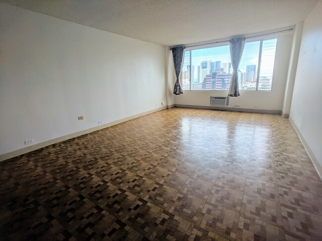 Building Photo - Spacious partly furnished Studio with electric/water utilities and no parking at Pacific Grand