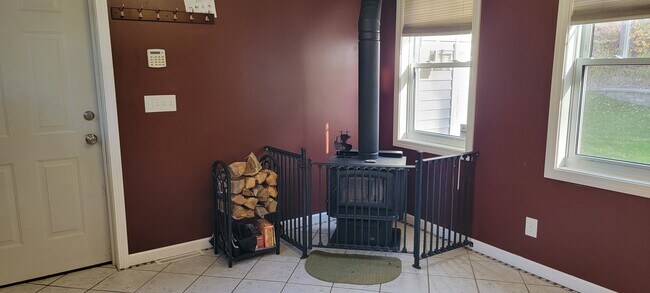 Woodstove located in the dining area - 203 Buckley Blvd
