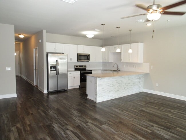 Building Photo - Close to Navy Federal complex, shopping & ...