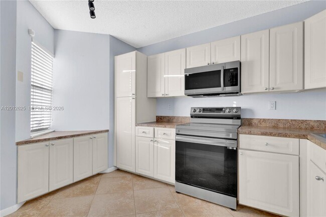 Building Photo - 3050 NW 42nd Ave