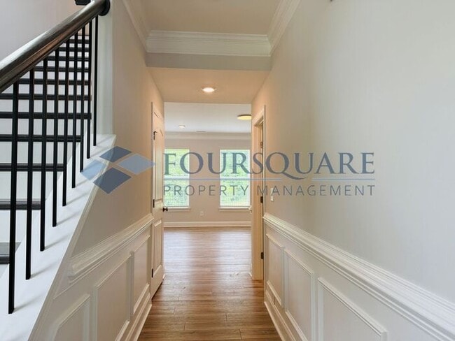 Building Photo - End-Unit Townhome with Fenced Yard, Washer/Dryer included & 2-Car Garage – Comfortable & Convenie...