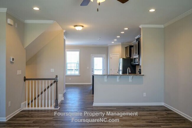 Building Photo - Modern 3-Story Townhome with Entry-Level Bonus Room, Back Deck & Garage , Community Pool in North...