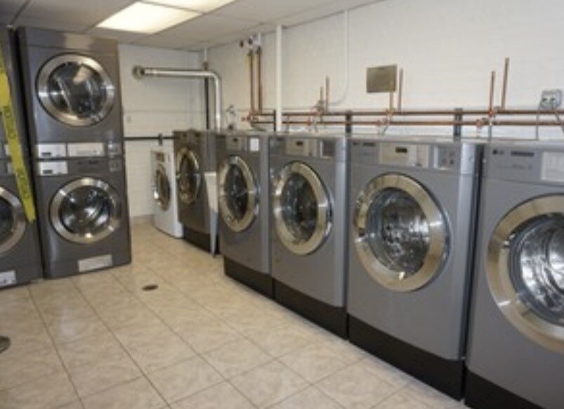 Free laundry room, steps away for your convenience. - 515 W Wrightwood Ave