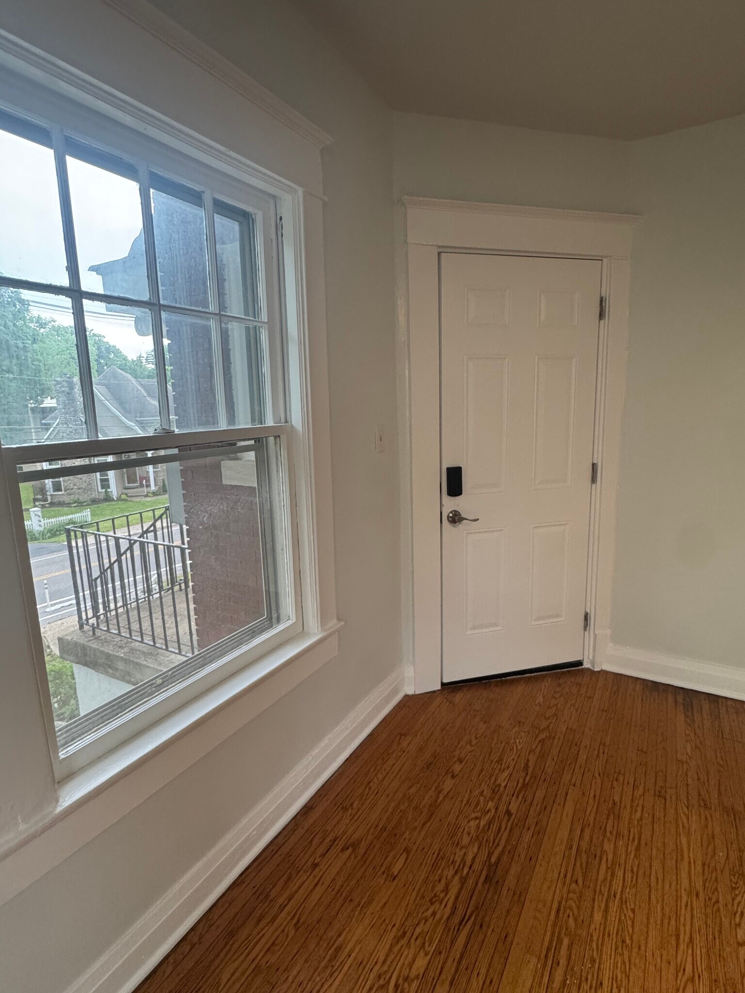 The front door (with keypad entry) opens into a shared foyer. - 1333 Castlewood Ave