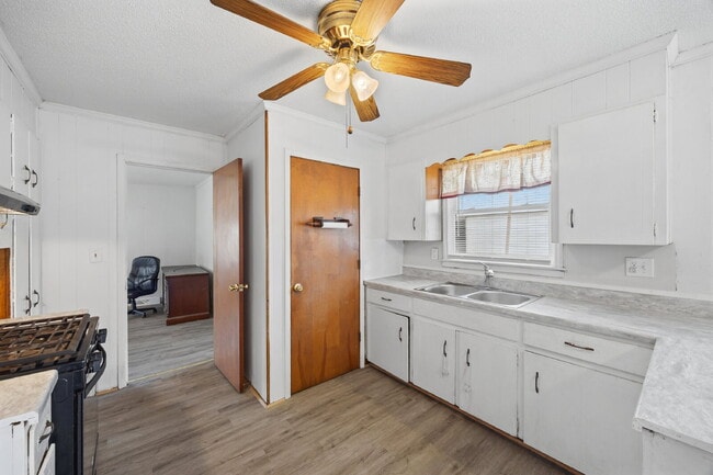 Building Photo - Classic Brick Ranch with 24x24 Workshop, Fenced Yard & Garden Beds