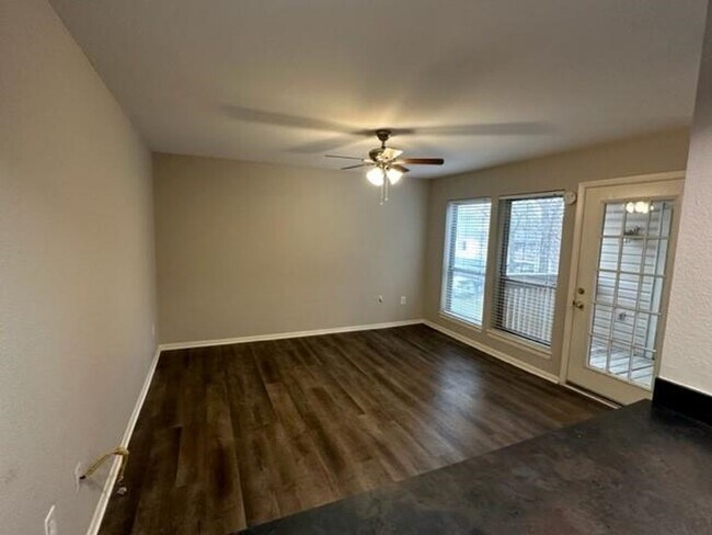 Building Photo - 6687 Whispering Oaks Place #2