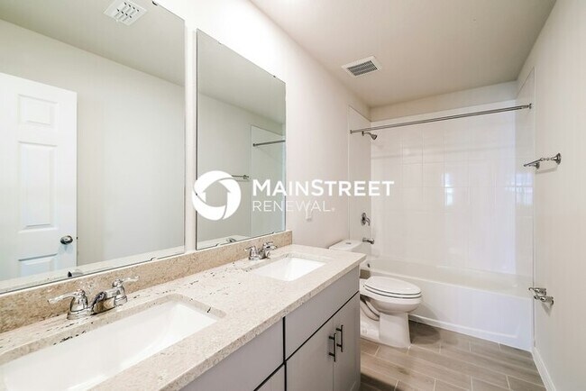 Building Photo - 4 Bedroom Pet-Friendly Home in Davenport, FL with Main Street Renewal