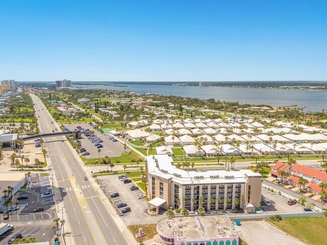 Building Photo - Wake Up to the Ocean Breeze – Your Beachsi...