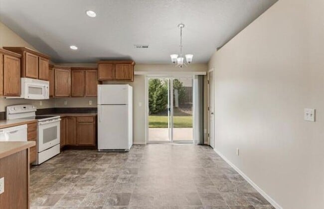 Building Photo - 3525 W 10th Ct