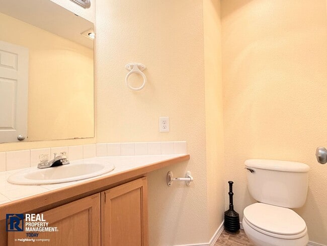 Building Photo - Spacious 4-Bedroom Townhome in Alicia Meadows | Garage, Patio & Pet Friendly