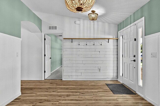 Building Photo - Modern 4-Bedroom, 3-Bath Home with Private In-Law Suite – Palm Coast, FL
