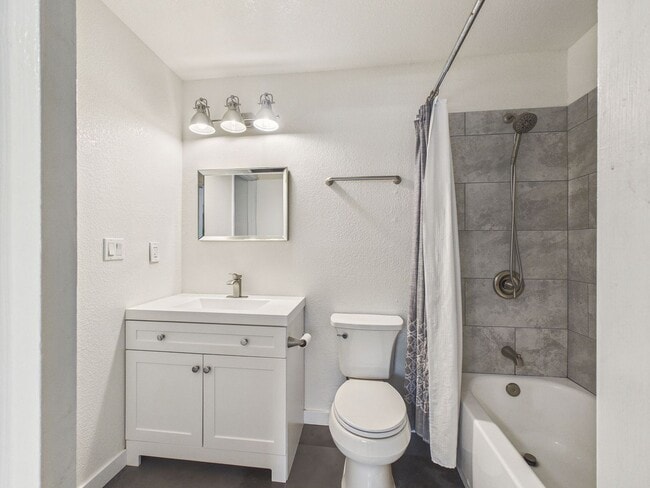 Building Photo - Updated 2 Bed / 1.5 Bath Townhome – In-Unit Washer & Dryer + Garage Parking – $2,700/month
